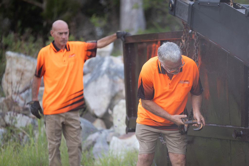 Workers Maintaining Outdoor Equipment